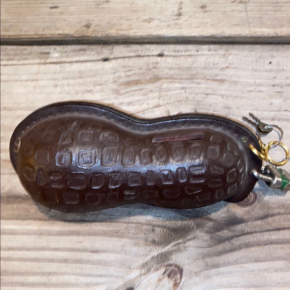 Vintage MCM Leather Peanut Bank with lock. 3 1/2 x 7.